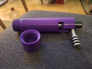 Dette er et bundstykke holde til bundstykke til en cal 22 riffle. Vi har selv designet det og bruge det i voser skytteforening, da bundstykket ikke kan tåle slag. Det er lave med bund skrue for nem rengøring.