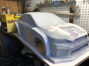 Mit 1/4 skala Subaru Impreza rallybil projekt. Karrosseriet og andre dele eks. Hjulophæng og gearkassen er designet og derefter 3D printet. Men den gamle printer er ved at være slidt, så trænger til udskiftning.